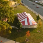 30x60 Red & White Striped Party Tent with fenced area
